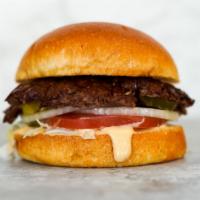 Smash Burger · Juicy, grilled beef burger smashed to perfection with fresh shredded lettuce, sliced tomato,...