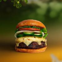 Laps For Jalapeno Burger  · Seasoned Beyond meat patty topped with melted vegan cheese, jalapenos, lettuce, tomato, onio...