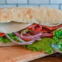 Spicy Combo · Spicy. Hot salami, hot capicola, hot calabrese, provolone cheese, mayonnaise, lettuce, tomat...