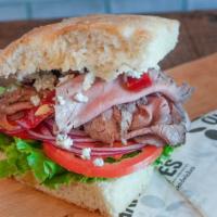 Roast Beef Special (Rbs) · House made roast beef, blue cheese crumbles, horseradish sauce, dijon, lettuce, tomato, red ...