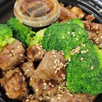 Beef & Chicken Bowl · Bowl of steamed White Rice. Beef and Chicken marinated in Ponzu Sauce, Garlic Butter. Carrot...