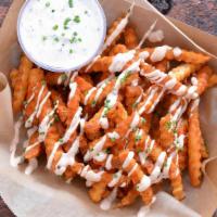 Cajun Garlic Fries With Buttermilk Ranch · Crispy crinkle cut fries tossed with Tendies’ Cajun garlic seasoning and served with homemad...