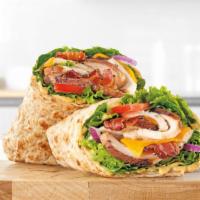 Chicken Club Wrap · It’s hard to pick a favorite ingredient in Arby’s new Market Fresh Chicken Club Wrap. For so...