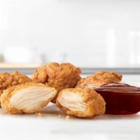 4 Piece Premium Nugget · 4 bite-sized pieces of all-white meat chicken in a crispy, seasoned breading.
