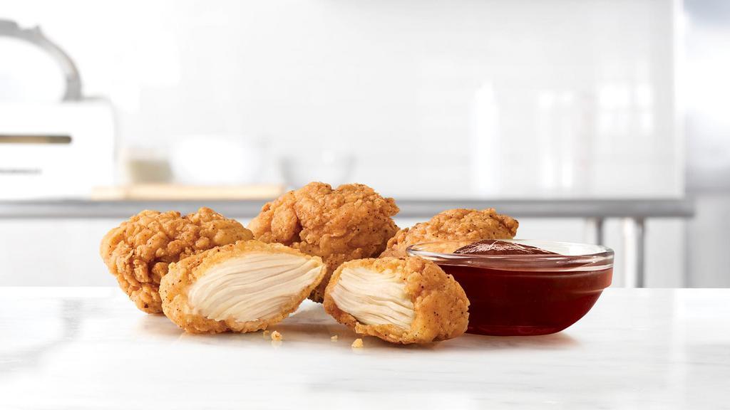 4 Piece Premium Nugget · 4 bite-sized pieces of all-white meat chicken in a crispy, seasoned breading.