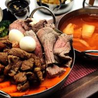 Beef Set Hot Pot Soup With Your Choice Of Broth · Thinly Sliced Angus beef, Stewed brisket and Crystal tendon, Cabbages, Carrot, Broccoli, Bea...