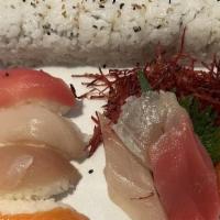 Combo 2 · 1 spicy tuna roll. 4pcs sashimi (tuna, albacore, salmon). 4pcs nigiri (tuna, albacore, salmo...