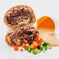 House Special Burrito · Top Serloin Roast Beef, Spanish Rice, Pinto Beans, Chipotle Aioli, House Salsa, Scalions.