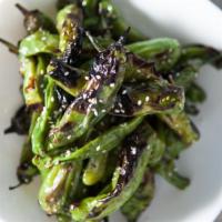 Shishito Peppers · Vegetarian. Charred and seasoned with sea salt, sesame seeds & olive oil.