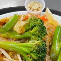 Pad Thai (Vegetable) · Sweet & spicy stir-fried rice noodles, assorted vegetables, eggs, spices & topped with roast...