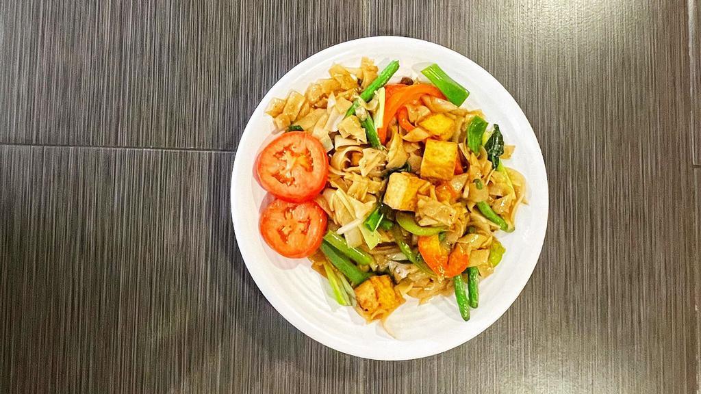 Drunken Noodle ( Tofu) · Spicy stir-fried rice noodles, assorted vegetables, and spices. Served spicy.