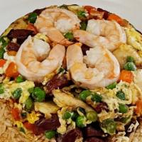 Volcano Fried Rice · Chinese sausage, chicken & shrimp.