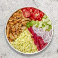 Chicken Shawarma Plate · Chicken shawarma plate. Comes with grilled tomato, spicy pepper, salad, rice, choice of side...