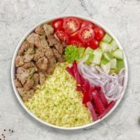 Beef Shawarma Plate · Beef shawarma plate. Comes with grilled tomato, spicy pepper, salad, rice, choice of side of...