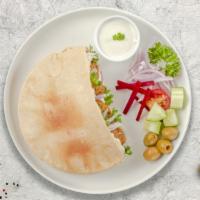 Falafel Wrap  · Hummus, lettuce, tomato, onion, and Tahini (white sauce).