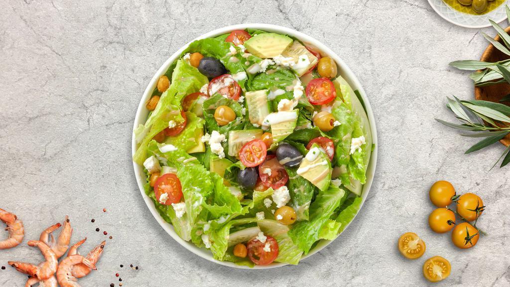 Mediterranean Salad · (Vegetarian) Romaine lettuce, cucumbers, cherry tomatoes, tahini, chickpeas, avocado, olives, and feta cheese tossed with Caesar dressing.