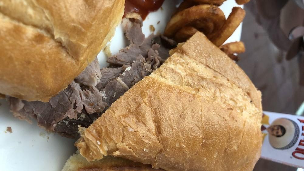 French Dip · Thin-sliced roast beef on a French roll with au jus.