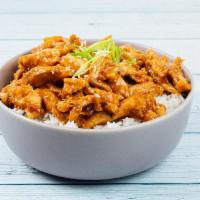 Peanut Chicken Bowl · Chicken over a bed of white or brown rice tossed w/ peanut sauce and optional choice of vegg...