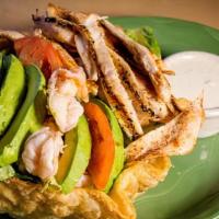 Ensalada De Pollo · Green salad served with grilled or cold chicken breast.