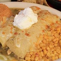 Enchilada Suizas · Two chicken enchiladas covered with our special green sauce. Served with rice, corn and sour...