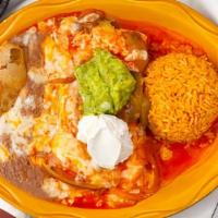 Enchiladas Rancheras · Two cheese enchiladas covered with our special ranchera sauce. Served with rice, beans, guac...