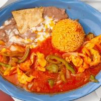 Pollo Ranchero · Chicken breast and vegetables covered with our ranchera sauce. Served with rice and beans an...
