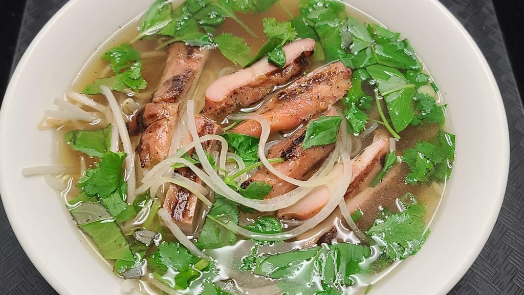 Grilled Chicken Rice Noodle (Pho) · Juicy tender chicken marinated with fresh Asian herbs and seasoning grilled to perfection served with Pho rice noodles and Pho broth.