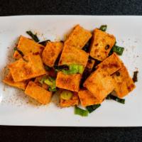 5 Spice Crispy Tofu · Crispy tofu tossed in 5 different Asian  herbs and spices. Very lightly spiced with peanut s...