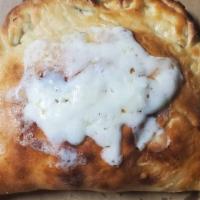 Meat Lover'S Calzone · Pepperoni, sausage, ham, bacon, ricotta and mozzarella cheeses.