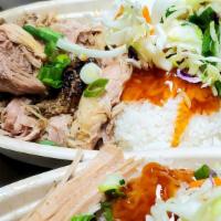 Kalua Pork Bowl · Slow cooked kalua pork over a bed of fluffy sticky rice.