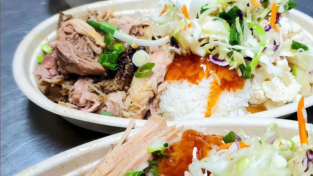 Kalua Pork Bowl · Slow cooked kalua pork over a bed of fluffy sticky rice.