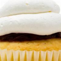 White Razzle · White cake, vanilla cream filling, raspberry, and vanilla mousse