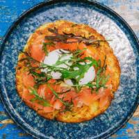 Potato Rosti · House cured salmon, herb cream cheese and two poached eggs.