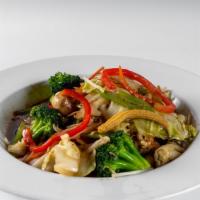 Vegetable Melange · Fresh vegetables and fried tofu, sautéed with garlic cloves and brown sauce.