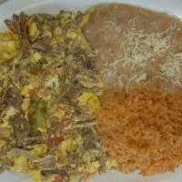 Eggs With Machaca Breakfast · Served with rice and beans.