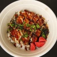 Pork Belly & Umami Gravy · Braised pork belly, umami gravy, seaweed, scallions, pickled radish, and rice.