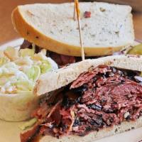 Hot Pastrami Sandwich · Served on our Fresh Baked Rye Bread with a Pickle and choice of Cole Slaw or Potato Salad. A...