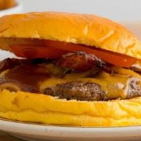 Bbq Burger · Thick-cut bacon, grilled onions, tomato, cheddar cheese and BBQ sauce.