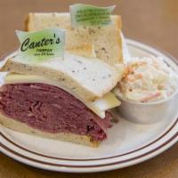 Downtowner · Choice of corned beef or pastrami with Swiss cheese.