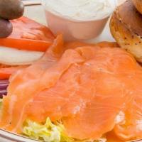 Smoked Salmon Plate · Lox. Served with tomatoes, onions & olives. Served with bread or bagel and cream cheese. Cap...