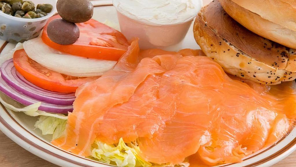 Smoked Salmon Plate · Lox. Served with tomatoes, onions & olives. Served with bread or bagel and cream cheese. Capers on request.