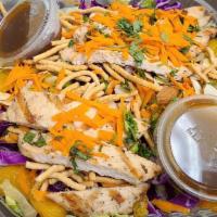 Chinese Chicken Salad · Chicken breast, served on Napa cabbage, red cabbage, cilantro, wonton, sliced almonds, carro...