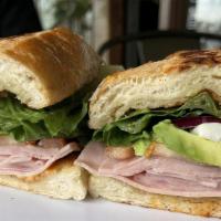 Ham Torta · Mexican birote roll with lettuce, tomato, onion, avocado, jalapeño, cheese and mayo or chipo...