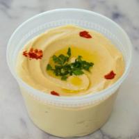 Hummus · 8 oz. crushed chickpeas with garlic, tahini and lemon juice.