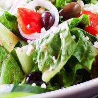 Greek Salad · A Fresh Mix of Lttuce, Tomatoes, Cucumbers, Parsley, Onions, Feta Cheese and Olives