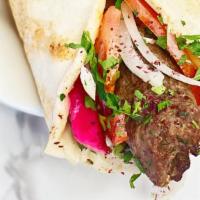 Beef Kefta Kebab Wrap · Hummus, lettuce, tomatoes, parsley, onions, turnips and sumak.