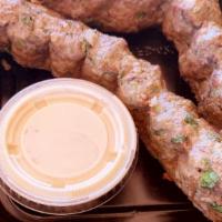 Beef Kefta Kebab · Deliciously spiced ground beef kebab mixed with parsley and onions.