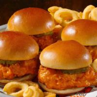 Buffalo Chicken Sliders · Buffalo Chicken tossed with your choice of wing sauce, topped with pickles and fries.