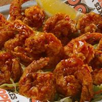 24 Buffalo Shrimp · Hooters was born at the beach in Florida so it didn't take long before fans started asking f...