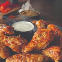 Roasted Wings - 20 Pieces · We've done it again. Starting with the tradional bone-in wings, oven roasted until crispy, k...